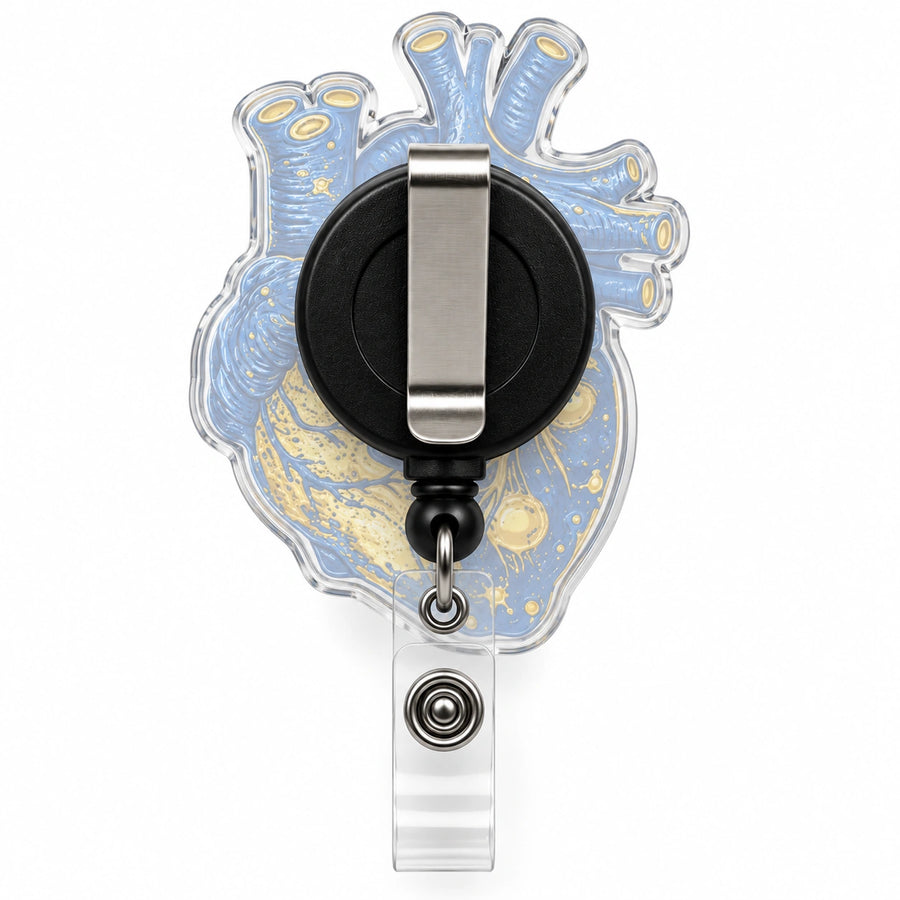 An anatomical heart-shaped retractable badge reel with a blue and gold marbled pattern, a black and silver clip, and a clear plastic loop, shown on a white background.