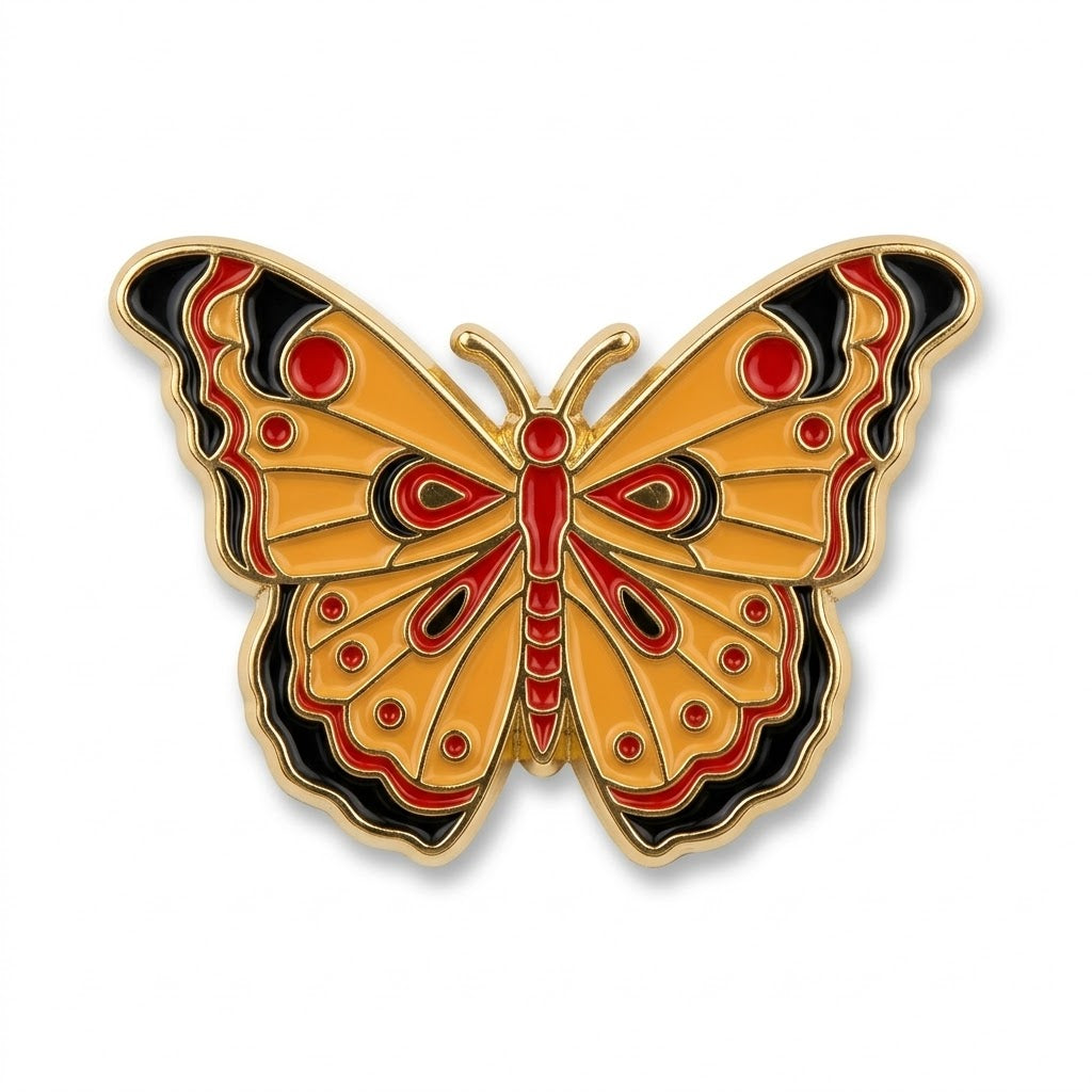 Orange, red and black butterfly enamel metal brooch with gold-tone outline